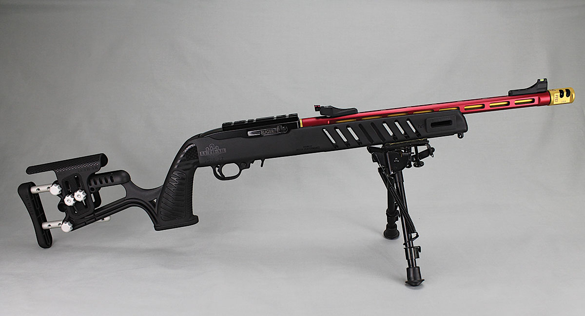 The stock’s barrel channel must be wide enough to accommodate the  Spitfire’s .920-inch diameter. Here, the stock is a Luth MCA-22, and the  Spitfire is accessorized with TANDEMKROSS Game Changer PRO  compensator and RIM/EDGE Eagle Eye Fiber Optic sights.
